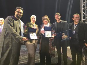 مجموعة من المكرمين والفنانين المشاركين في فعاليات مهرجان الأقصر السينمائي الإفريقي